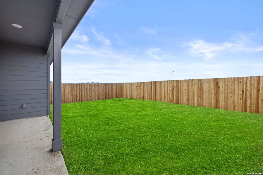 Exterior details and patio area of a home in Voss Farms, New Braunfels (Image 2).