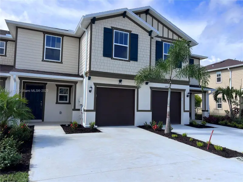 Front exterior of a new home in , Fort Myers, FL, highlighting curb appeal (Image 2). Front exterior of a new home in , Fort Myers, FL, highlighting curb appeal (Image 2).