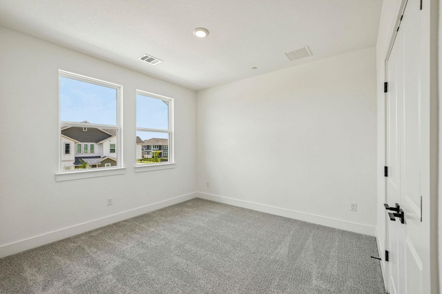 Spacious, unfurnished interior of a new home in Avery Centre, Round Rock (Image 24).