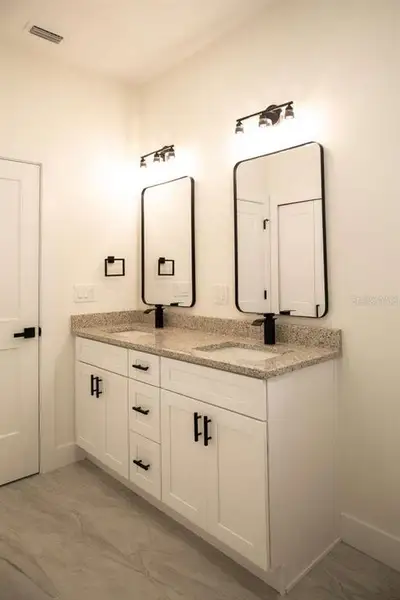 Furnished interior view inside a new home in , North Port (Image 17).