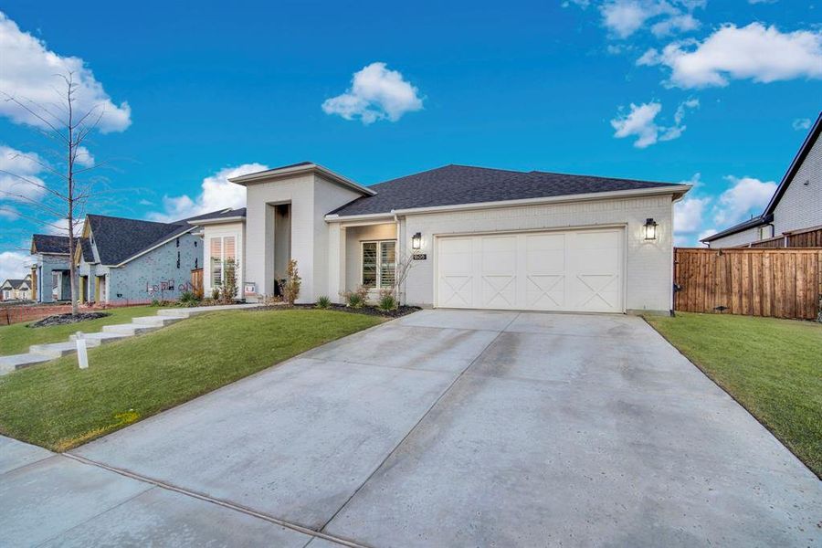 Front exterior of a new home in Sweetgrass, Haslet, TX, highlighting curb appeal (Image 21).