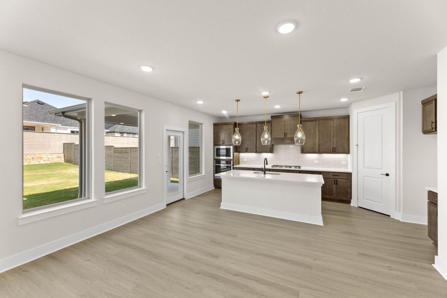 Image 8 representing the Holly by Tri Pointe Homes in Treeline, Justin, TX.