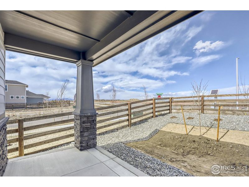 Exterior details and patio area of a home in Barefoot Lakes, Firestone (Image 4).