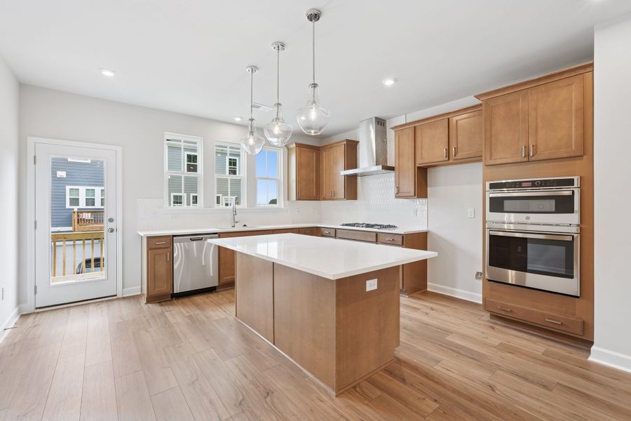 Representative furnished interior of a home built from the Nola by Tri Pointe Homes in Holding Village, Wake Forest (Image 5).
