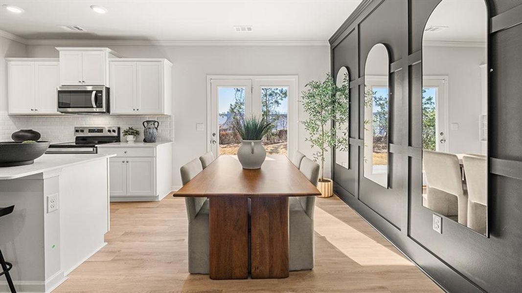 Furnished interior view inside a new home in Harvest Park, Decatur (Image 7).