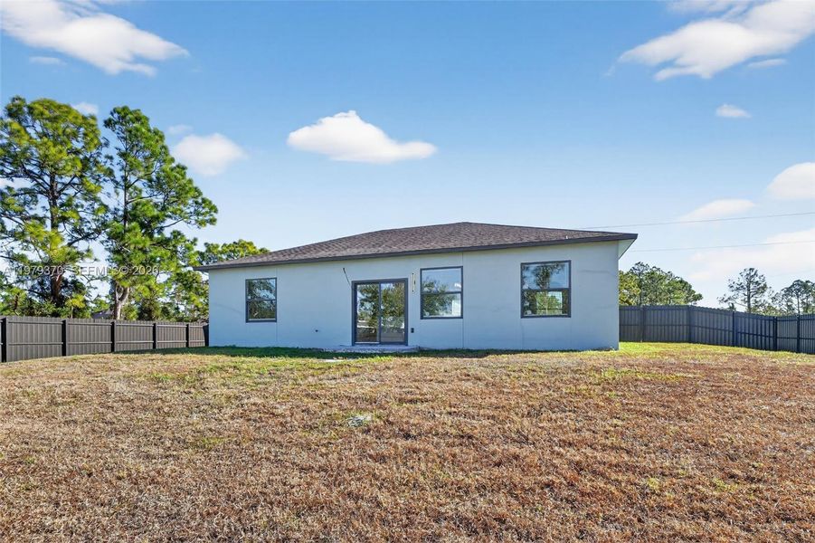 Exterior details and patio area of a home in , Lehigh Acres (Image 22). Exterior details and patio area of a home in , Lehigh Acres (Image 22).