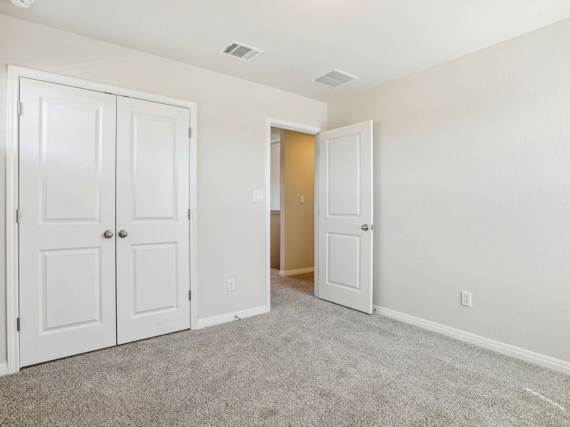 Spacious, unfurnished interior of a new home in Turner's Crossing - Reserve Collection, Buda (Image 14).