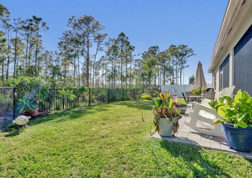 Exterior details and patio area of a home in Preserves at Park Trace, Stuart (Image 4).