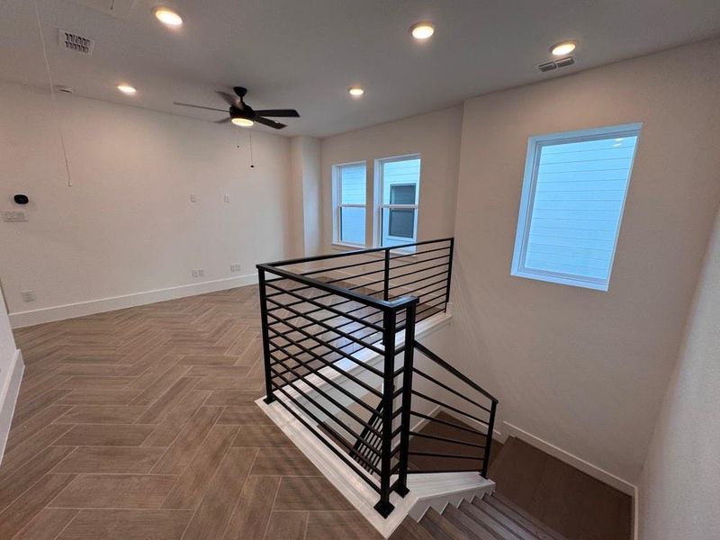 Spacious, unfurnished interior of a new home in Easthaven at Bridgeland Central - Vision Collection, Cypress (Image 27).