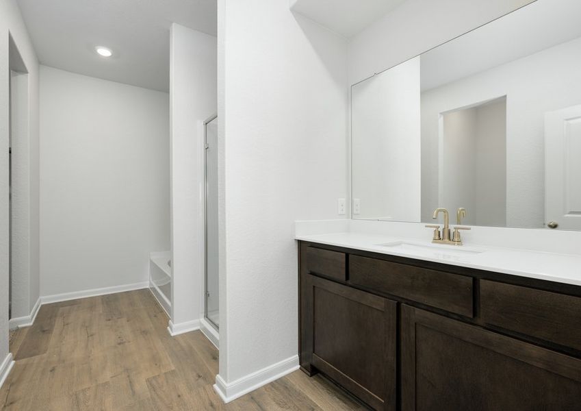 The master bathroom has a nice vanity space.