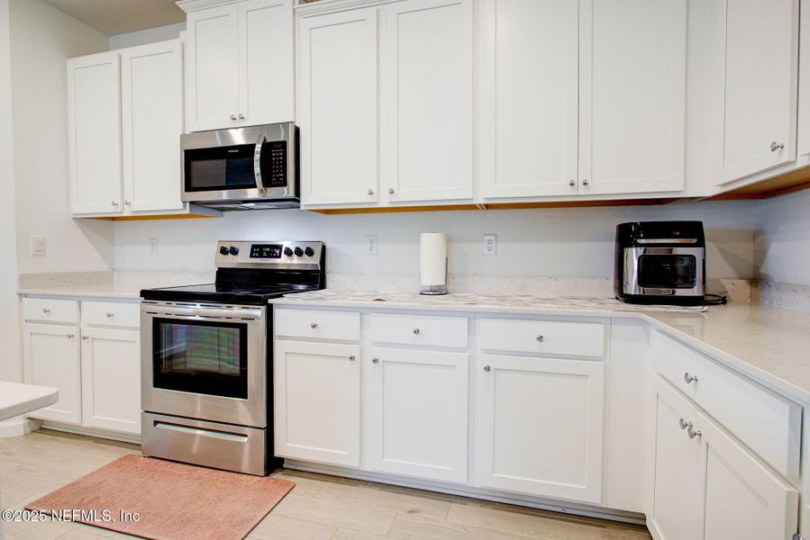 Furnished interior view inside a new home in , Green Cove Springs (Image 10).