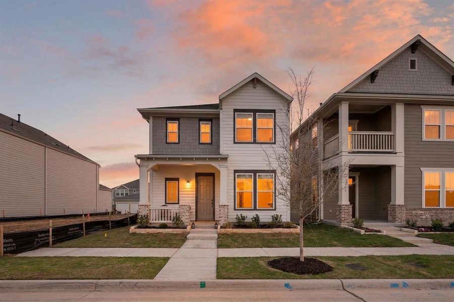 Front exterior of a new home in The Retreat at Harvest, Argyle, TX, highlighting curb appeal (Image 20).