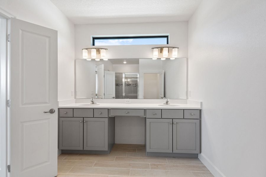 Representative furnished interior of a home built from the Oceanside by Park Square Residential in Paradiso Grande, Orlando (Image 15).