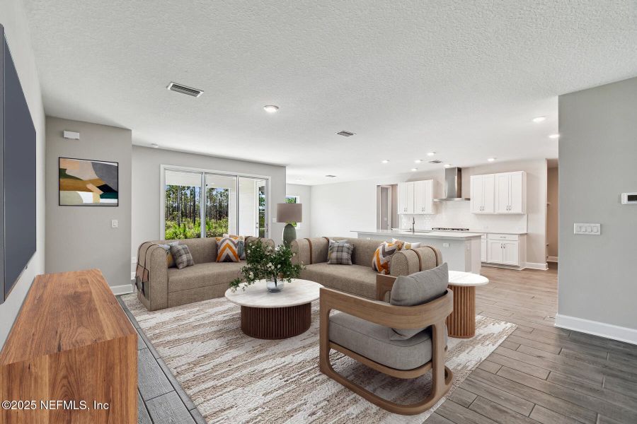 Furnished interior view inside a new home in Tributary 70', Yulee (Image 9).
