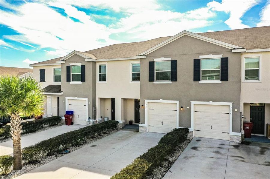 Front exterior of a new home in , Plant City, FL, highlighting curb appeal (Image 27).