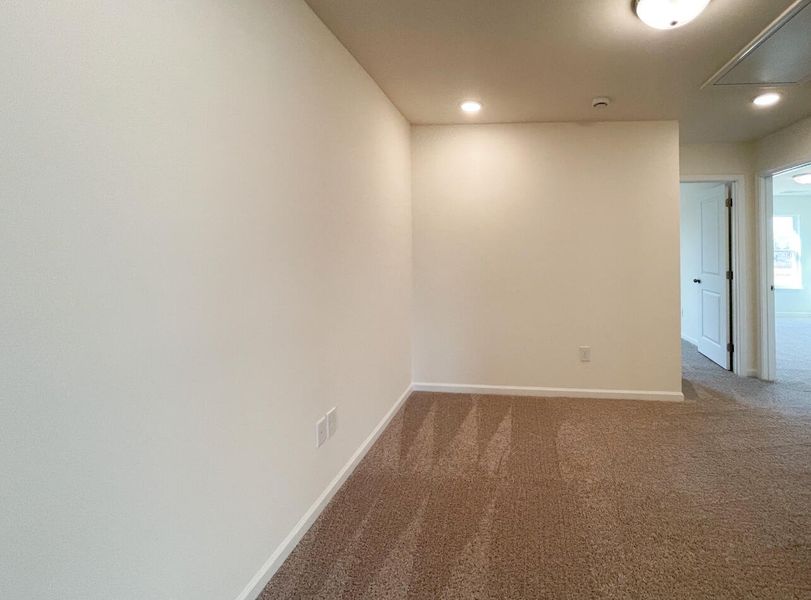 Spacious, unfurnished interior of a new home in Bellevue Townhomes, Greenville (Image 20).