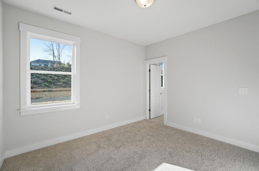 Spacious, unfurnished interior of a new home in Rone Creek, Waxhaw (Image 60).