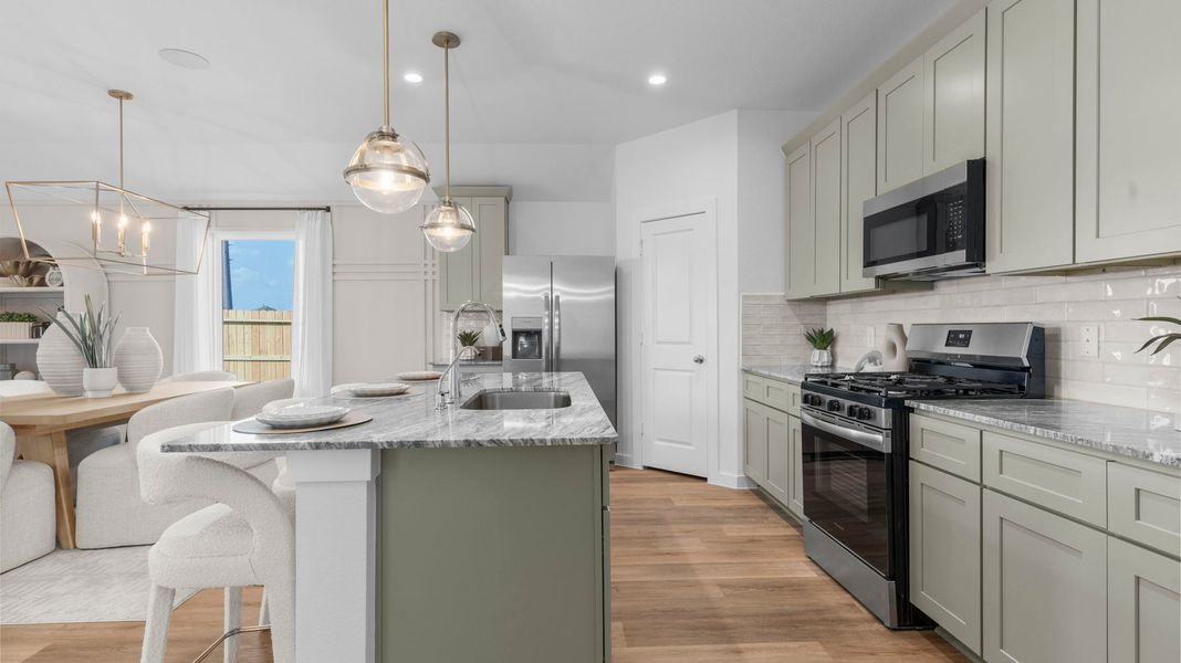 Furnished interior view inside a new home in Caldwell Crossing, Iowa Colony (Image 5).