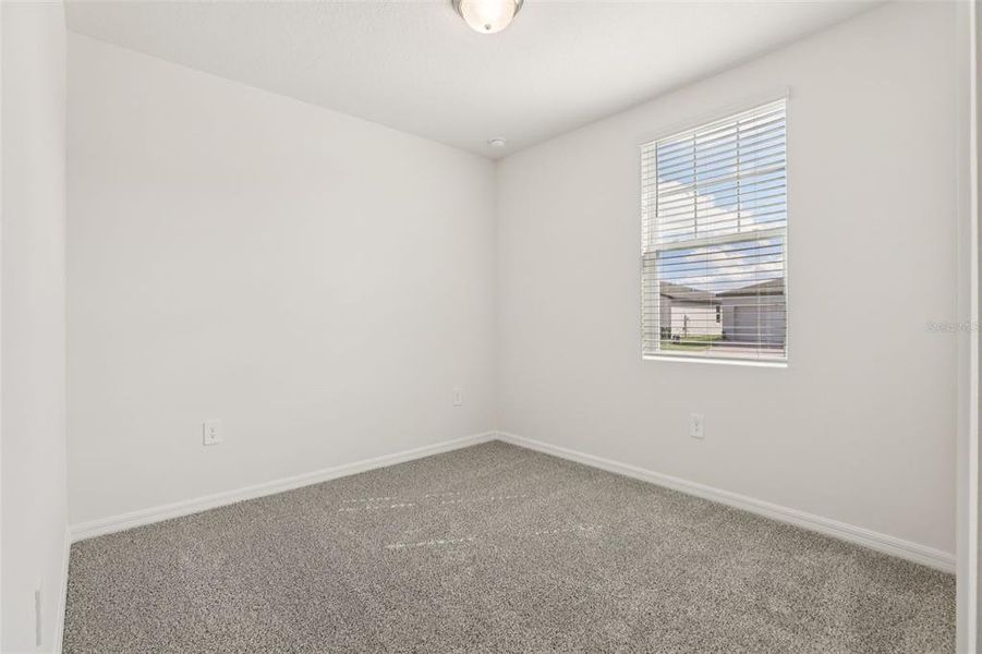 Spacious, unfurnished interior of a new home in Lawson Dunes - Signature Series, Haines City (Image 35).