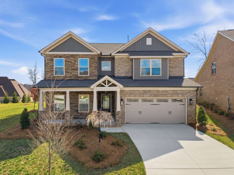 Front exterior of a new home in Blacksmith, Stokesdale, NC, highlighting curb appeal (Image 33).