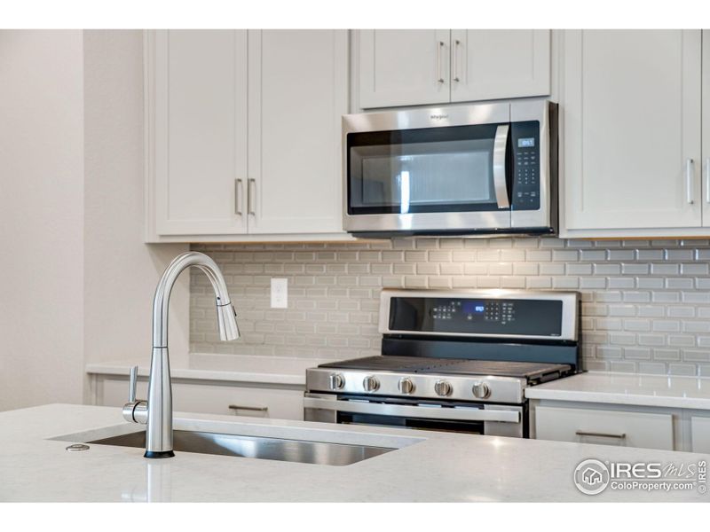 Furnished interior view inside a new home in Westside Crossing Paired Homes, Berthoud (Image 7).