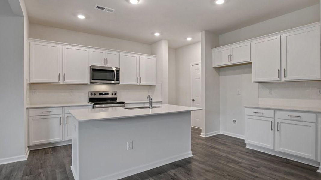Furnished interior view inside a new home in The Grove at Matthews Landing, Fuquay Varina (Image 7).