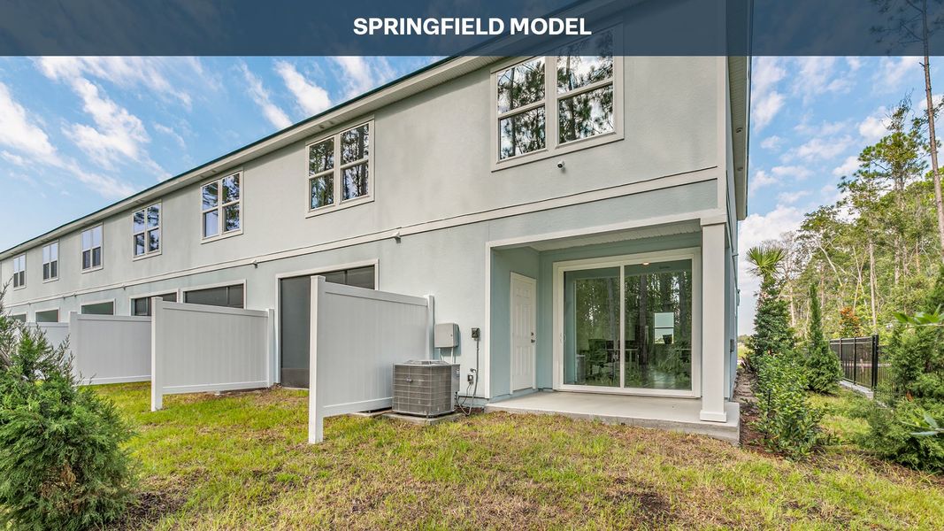 Front exterior of a new home in Cordera Townhomes, St. Augustine, FL, highlighting curb appeal (Image 2).