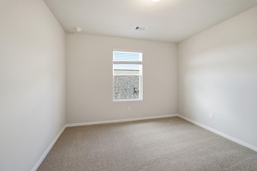 Spacious, unfurnished interior of a new home in The Pines at Seven Coves, Willis (Image 22).