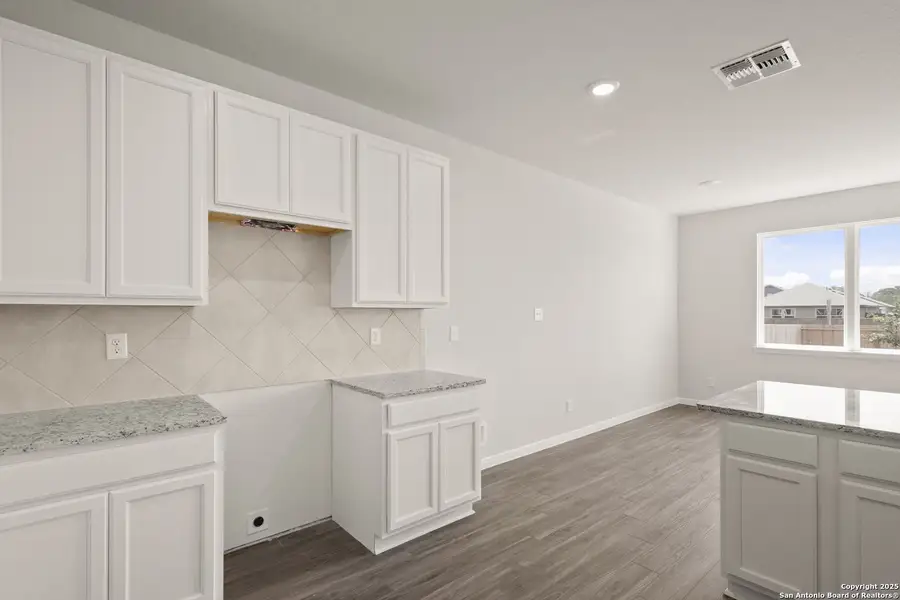 Furnished interior view inside a new home in Abbott Place, St. Hedwig (Image 5).