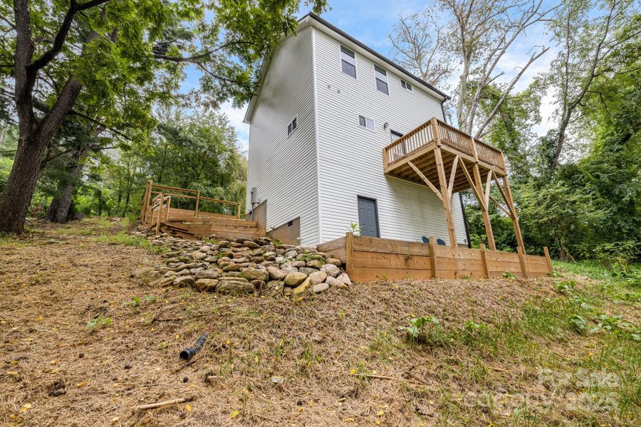 Front exterior of a new home in , Asheville, NC, highlighting curb appeal (Image 26).