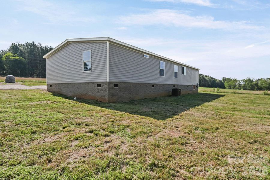 Exterior details and patio area of a home in , Polkton (Image 28).