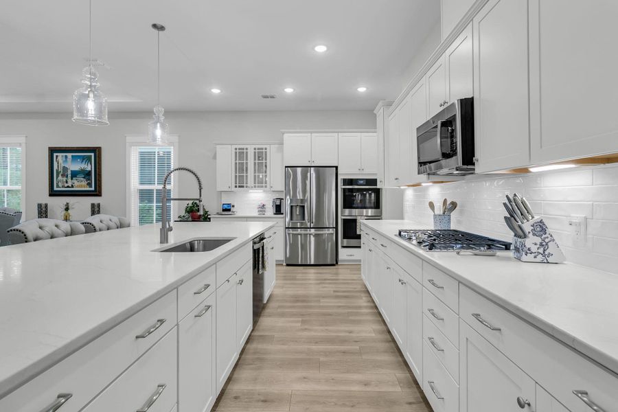 Furnished interior view inside a new home in K. Hovnanian's® Four Seasons at Lakes of Cane Bay, Summerville (Image 10).