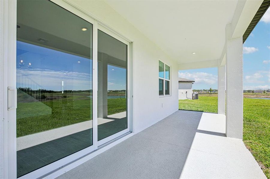 Exterior details and patio area of a home in Magnolia Bay - Reserve Series, Nokomis (Image 22).