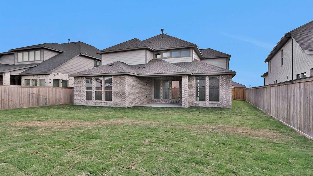 Exterior details and patio area of a home in Bridgeland 55', Cypress (Image 1). Exterior details and patio area of a home in Bridgeland 55', Cypress (Image 1).