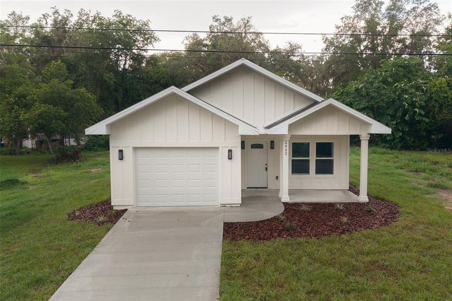Front exterior of a new home in , Gainesville, FL, highlighting curb appeal (Image 1). Front exterior of a new home in , Gainesville, FL, highlighting curb appeal (Image 1).