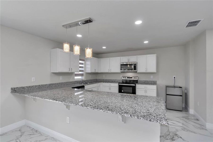 Furnished interior view inside a new home in Diamond Ridge, Belleview (Image 10).