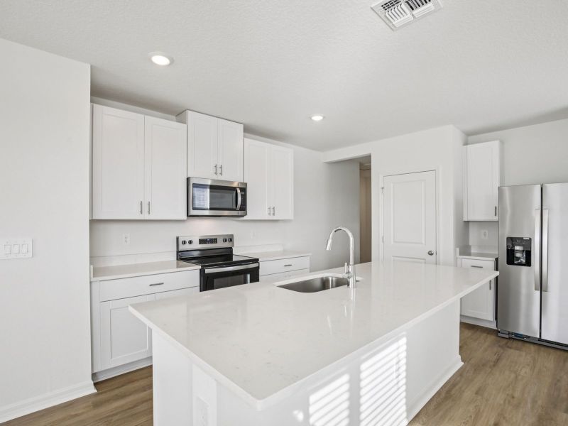 Furnished interior view inside a new home in Salt Meadows - Premier Series, Parrish (Image 3).