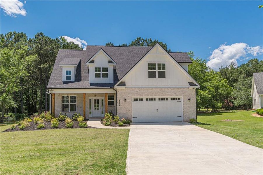 Front exterior of a new home in , McDonough, GA, highlighting curb appeal (Image 22).
