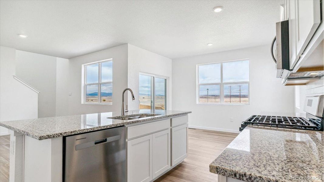 Furnished interior view inside a new home in The Ridge at Lorson Ranch, Colorado Springs (Image 5). Furnished interior view inside a new home in The Ridge at Lorson Ranch, Colorado Springs (Image 5).