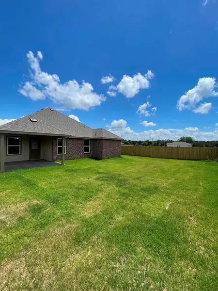 Exterior details and patio area of a home in , Springtown (Image 3).
