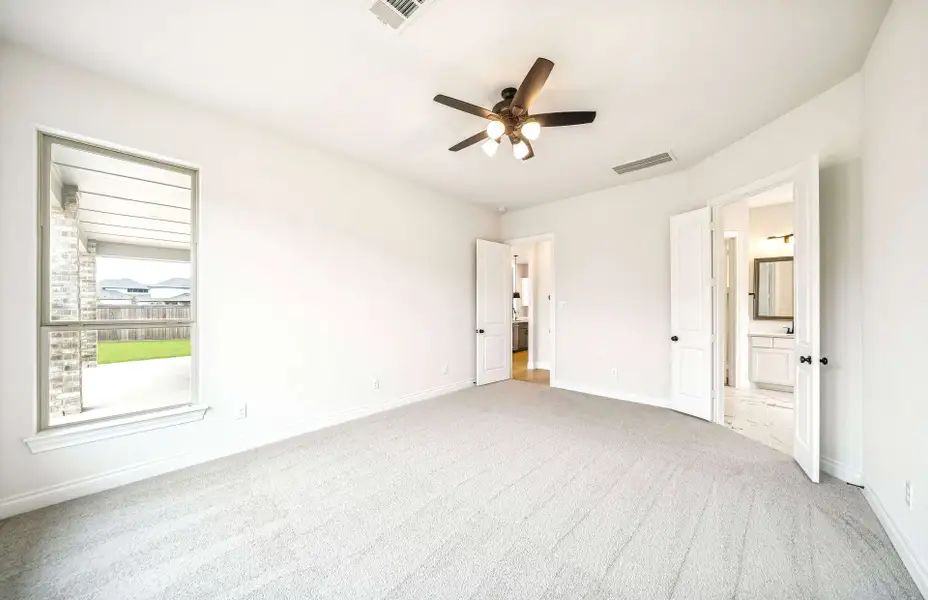 Spacious, unfurnished interior of a new home in Bridgeland 60′, Cypress (Image 24).
