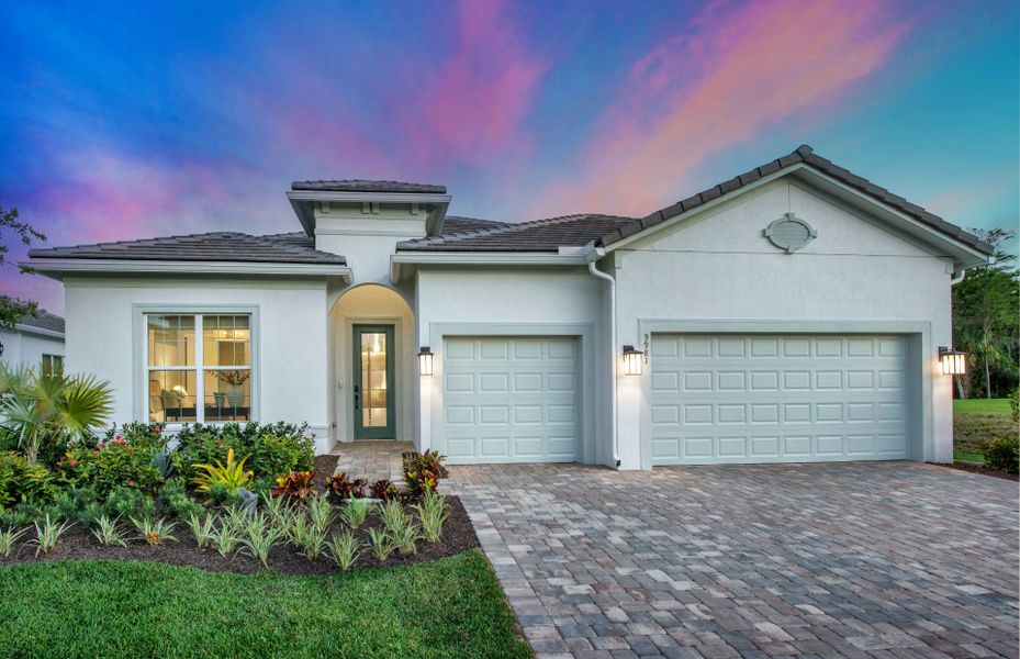 Front exterior of a new home in Highpointe, Stuart, FL, highlighting curb appeal (Image 1).