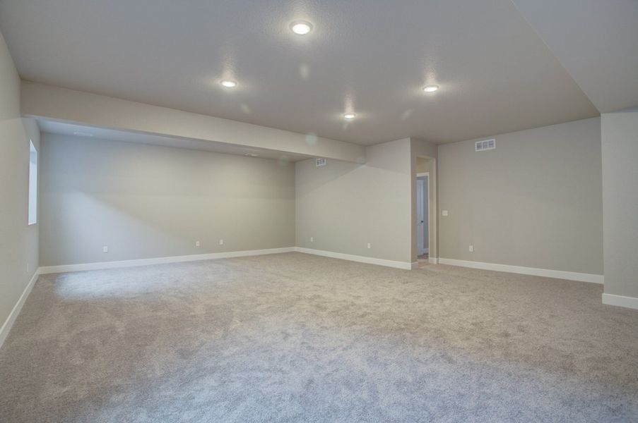 Representative unfurnished interior of a home built from the The Ivyglen by David Weekley Homes in Wolf Ranch - Enclave Collection, Colorado Springs (Image 14).