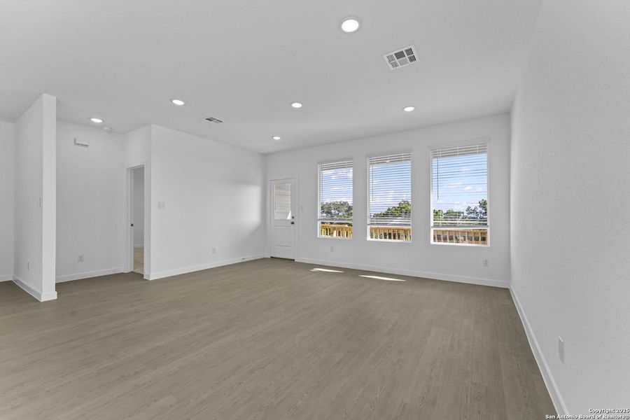 Spacious, unfurnished interior of a new home in Waterwheel: Coastline Collection, San Antonio (Image 15).