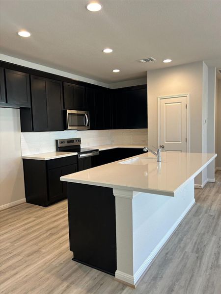 Center Island in Open Concept Kitchen - Representative Photo Center Island in Open Concept Kitchen - Representative Photo