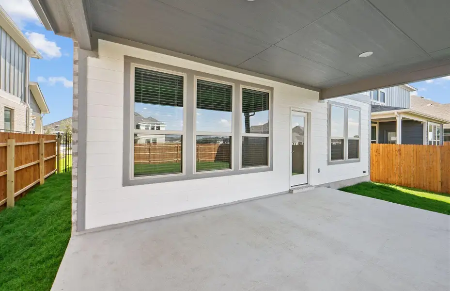 Exterior details and patio area of a home in Santa Rita Ranch, Liberty Hill (Image 2). Exterior details and patio area of a home in Santa Rita Ranch, Liberty Hill (Image 2).
