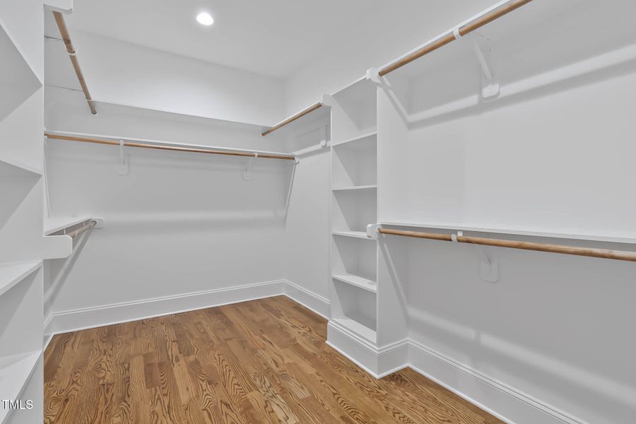 Main Bedroom Closet with Solid Shelving