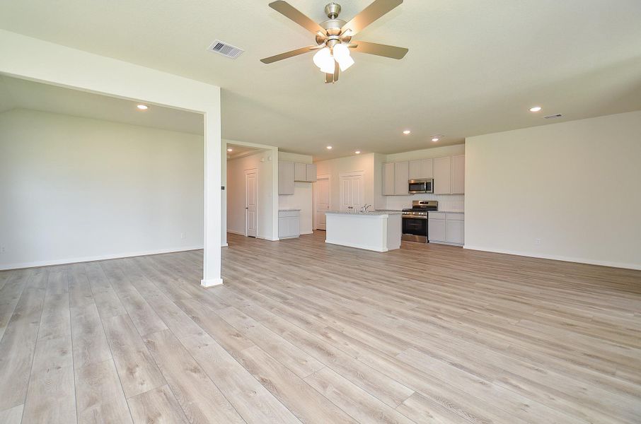 Spacious, unfurnished interior of a new home in Sunterra, Katy (Image 23).