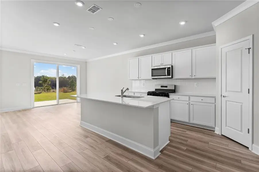 Furnished interior view inside a new home in Overland, Locust Grove (Image 3).