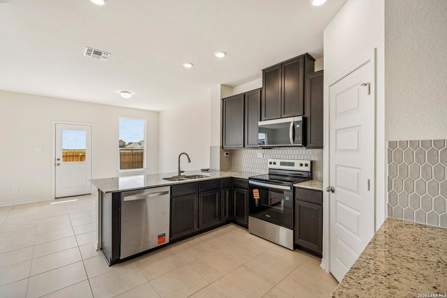Furnished interior view inside a new home in Woodside Farms, Seguin (Image 10).